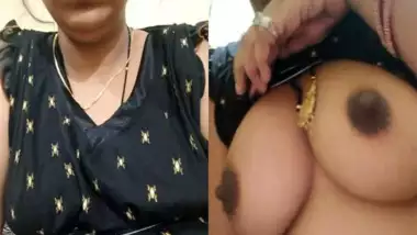 Mature Desi pulls dress up to expose saggy tits in self-made XXX video