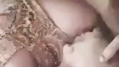Guy sucks the amateur Desi porn XXX Paki model's nipples on camera